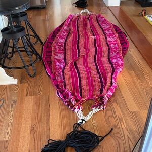 Vibrant Pink and Red Striped Hammock includes rope leads to tie to poles or tree